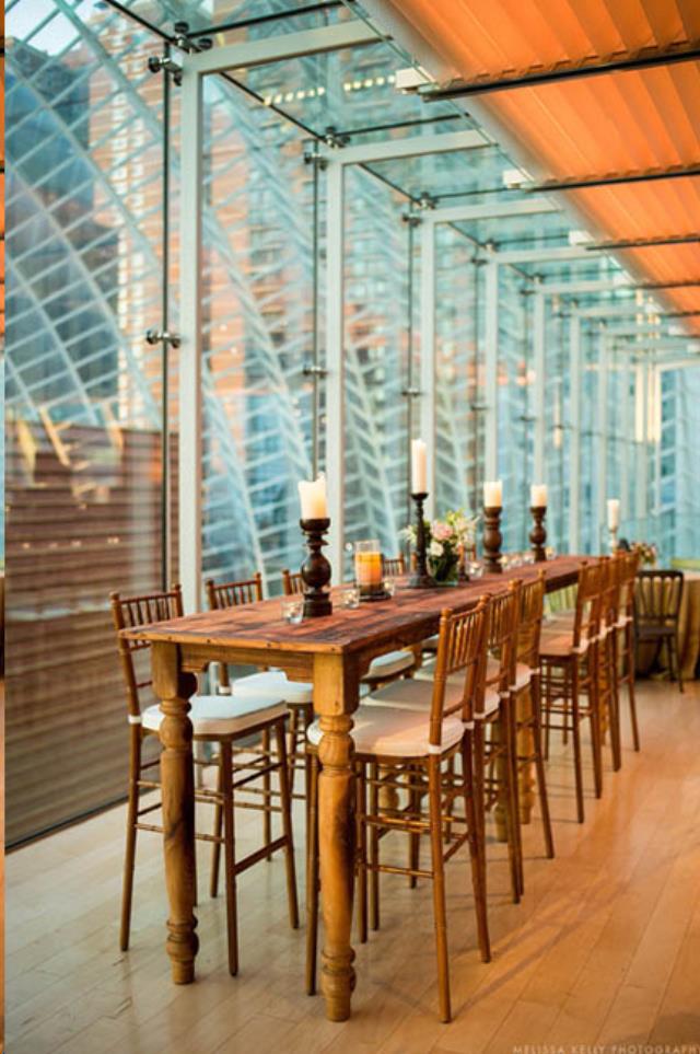 Fruitwood Chiavari barstools lined up at a 42-inch high-top table for a cocktail-style event in Atlanta, Georgia